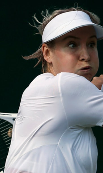 The Latest: Tsonga-Querrey match suspended at Wimbledon